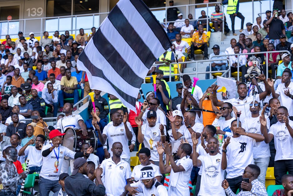 Ugandan Fans Celebrate Coventry City’s Promotion
