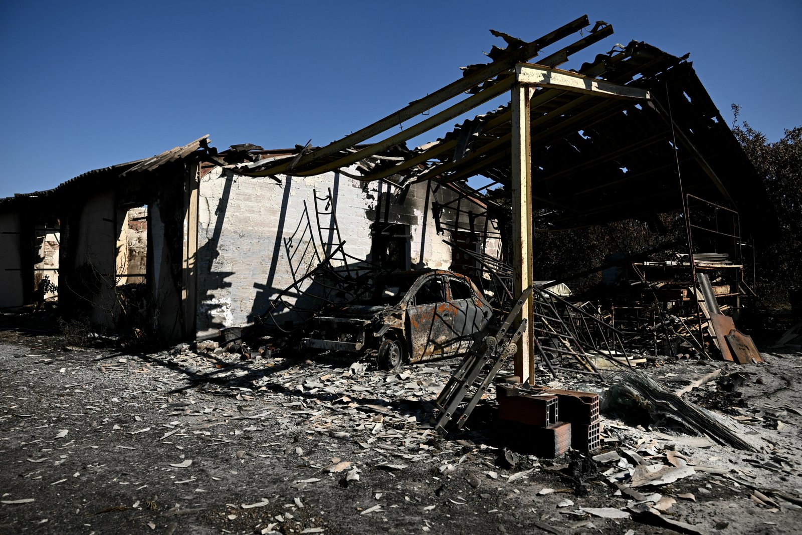 Photos: Spain and France’s battle record wildfires