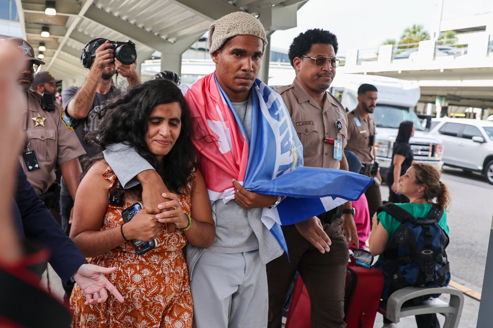 Cuban artist and dissident exiled from country after 5 years in prison arrives in US Cuban artist and dissident exiled from country after 5 years in prison arrives in US