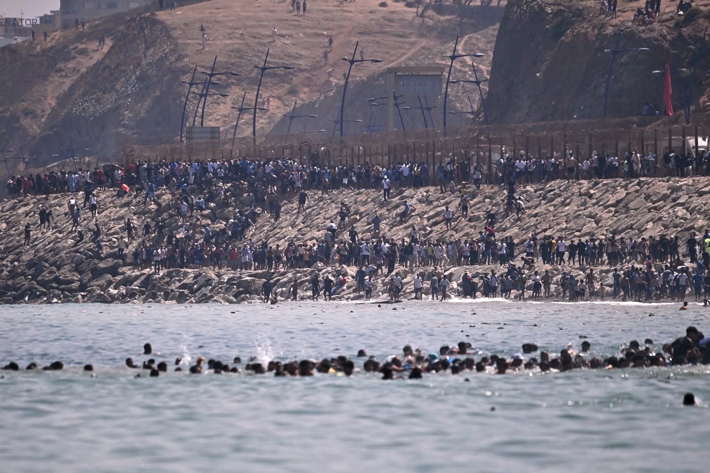 Spain deploys military to Ceuta after thousands of people breach Morocco’s border